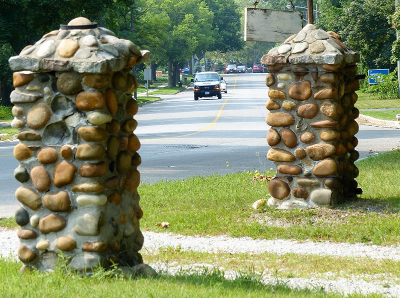These entry pillars flank a driveway at the west end of Lakeshore Road. - George Mathewson
