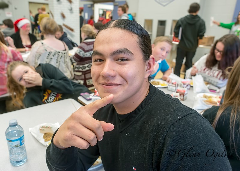 Gavin White and his pals are all smiles after sitting down to a turkey dinner lunch at St. Clair Secondary School.