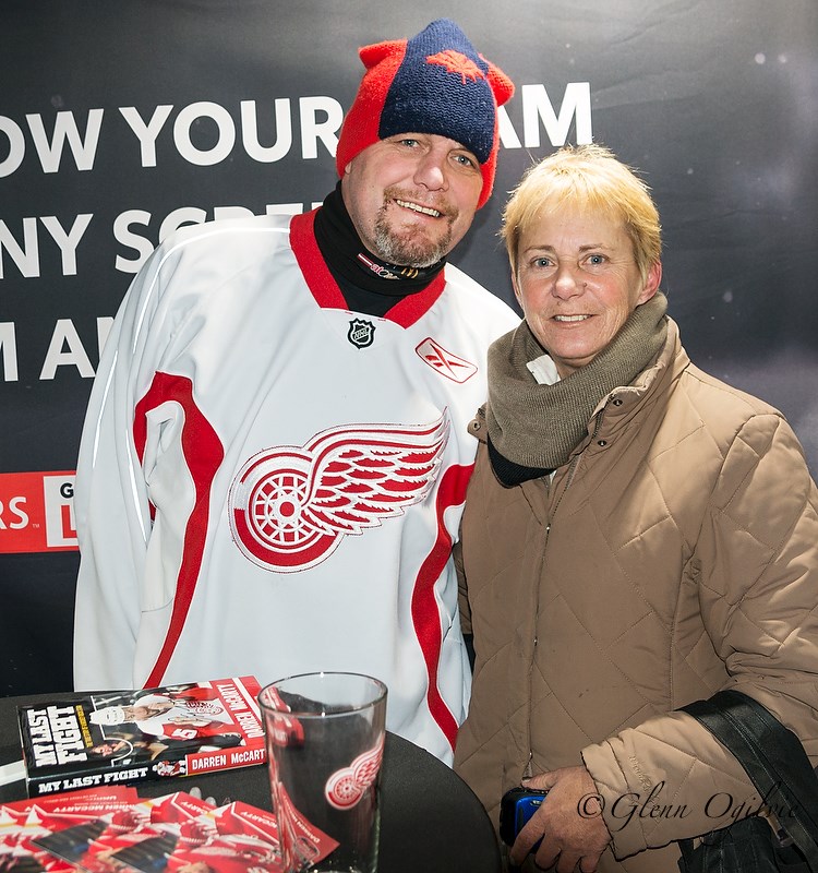 Detroit Red Wing great Darren McCarty autographed a book for Sarnia's Julie Fisher and her son Mitch Corte.   