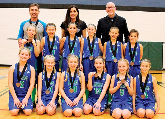 At the same tournament, The Huron Lakes girls atom team won a bronze medal. From left are, front row: Samantha Maitland, Layla MacKenzie, Emerson Giresi, Ashlyn Morgan, Madison Hobin, and Avery Geary; middle row: Teighan Stoukas, Alexis Tsaprailis, Aliyah Shaw, Hanna Steeves, Lyndi MacDonald and Reagan Harrison, and back row: Coaches George Stoukas, Pauline Turner and Andy Shaw. Submitted Photo
