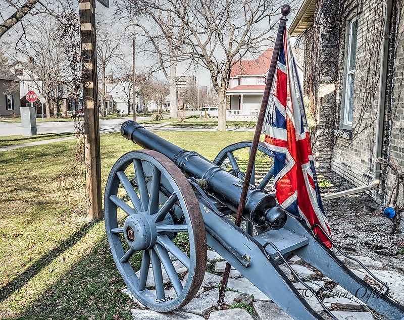 Karl Cole and his home made cannon at the corner of Maria and College Streets