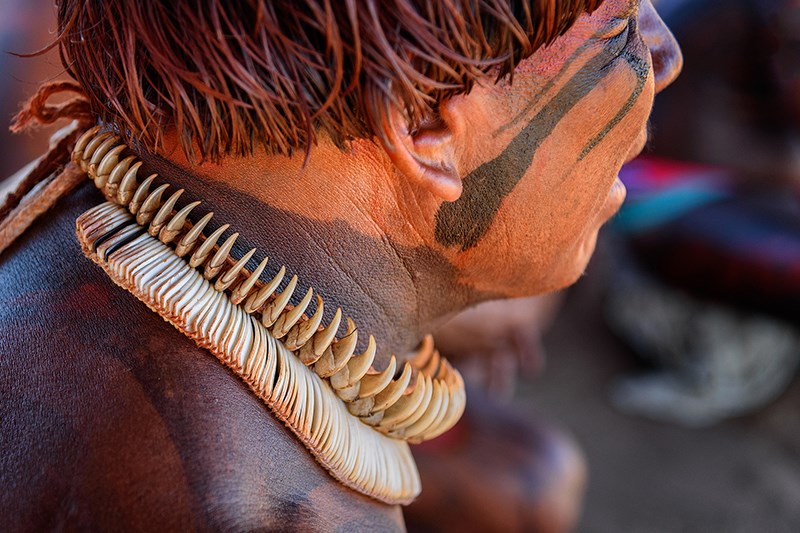 A Kalapalo wears a necklace made from the claws of the Jaguar. Kieron Nelson