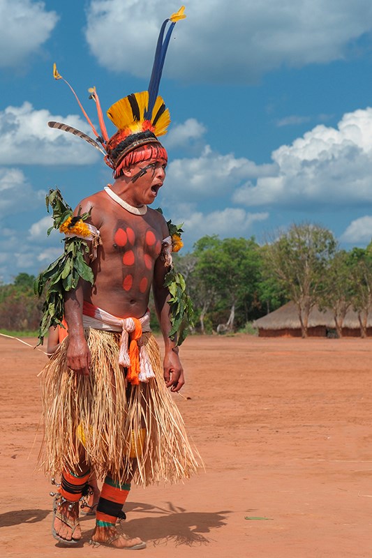 The Waura tribe wear characteristic headdresses often made from the feathers of parrots, macaws and other colourful birds. Kieron Nelson