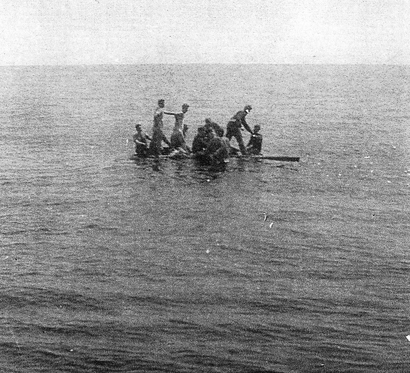 Survivors of the torpedoed HMCS Esquimalt cling to life floats shortly before their rescue by the HMCS Sarnia. Submitted Photo