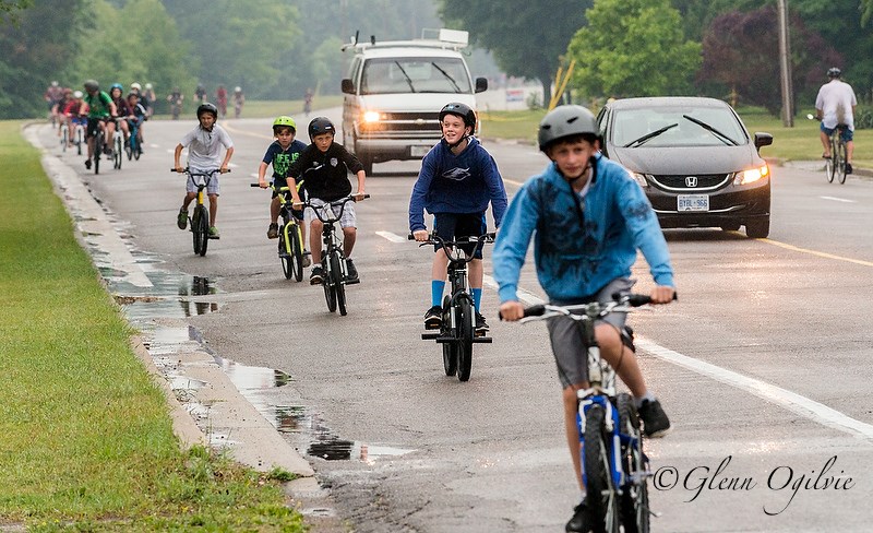 More than 150 elementary school cyclists, led by police and volunteers on Cathcart Boulevard, took part in the Ride Don't Hide event. 