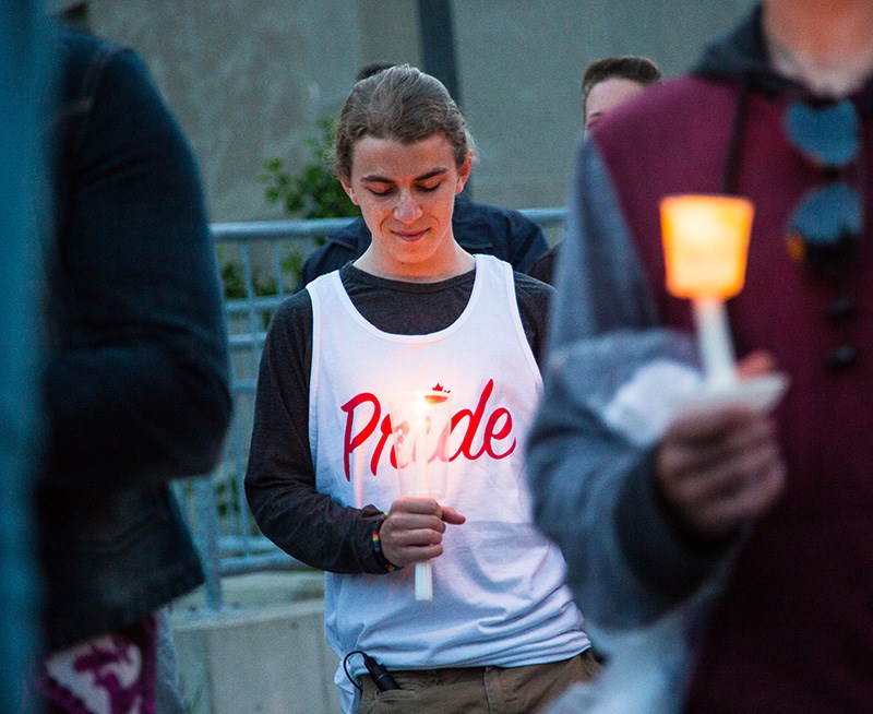 Nicholas Long participates in a June 13 candlelight vigil at Sarnia city hall to remember those slain in Orlando, Florida's mass shooting. “I’m gay, so that could’ve been me in the club that would’ve been shot, just for being gay,” Long said.  Troy Shantz, Special to The Journal