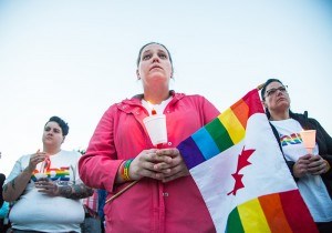 Samantha Thompson of the Sarnia Pride Alliance participates in a candlelight vigil Monday at Sarnia city hall. Troy Shantz, Special to The Journal