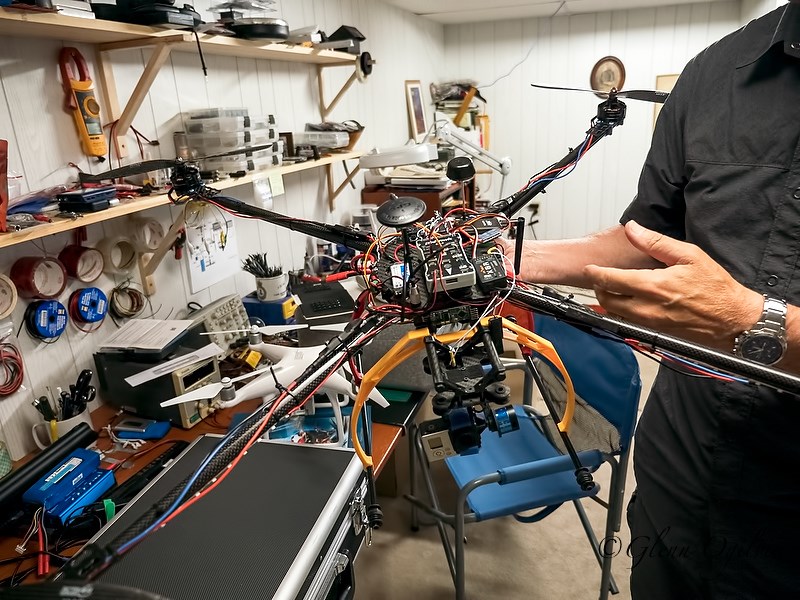 David Cooke holds a drone he built before launching his own aerial photo and video business. Glenn Ogilvie 