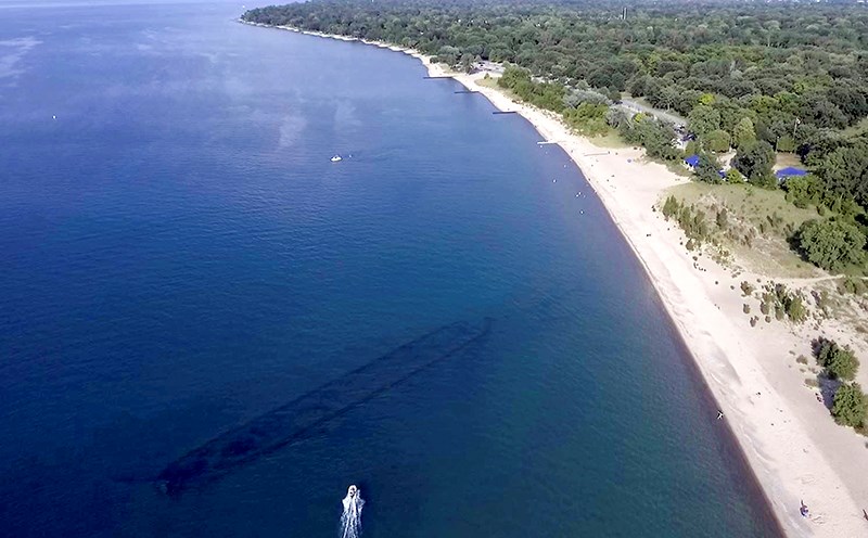 This photo, taken by a drone, shows a recreational pleasure boat about to pass over the sunken wreck of the .... , which lies just off the beach at Canatara Park. Drone photo, courtesy of David Cooke, inskyphoto.com