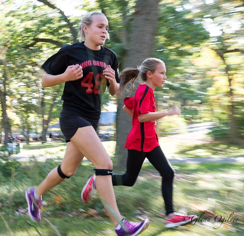 Morgan Hughes, of King George VI, left, and Alaina Burns, of Bridgeview, compete in Canatara Park. Glenn Ogilvie     Hundreds of highly spirited elementary school kids converged at Canatara Park for the annual cross country meet.