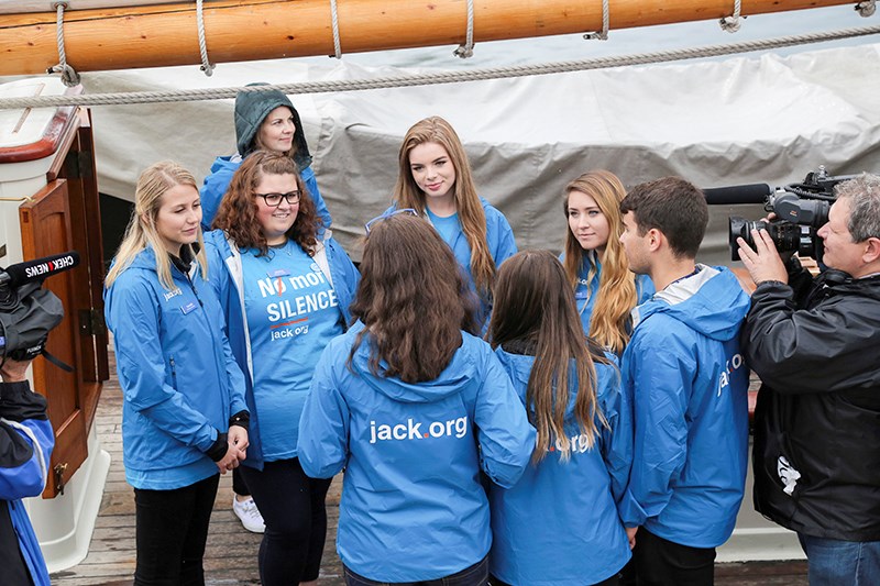 Jessica Tetreault-Fazio, second from left in circle, and other members of jack.org meet the media on Oct. 1 in British Columbia. Submitted Photo