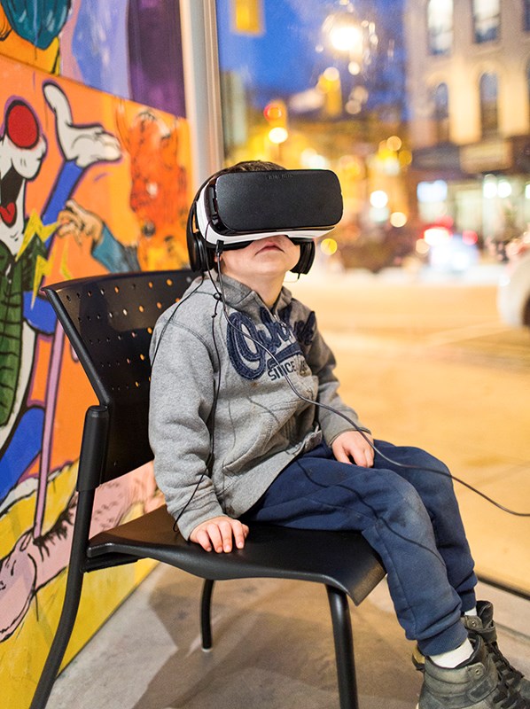 Lake Shantz, 4, tries out a Virtual Reality headset during A SWIFF demonstration at the Judith and Norman Alix Art Gallery on Nov. 4. Troy Shantz