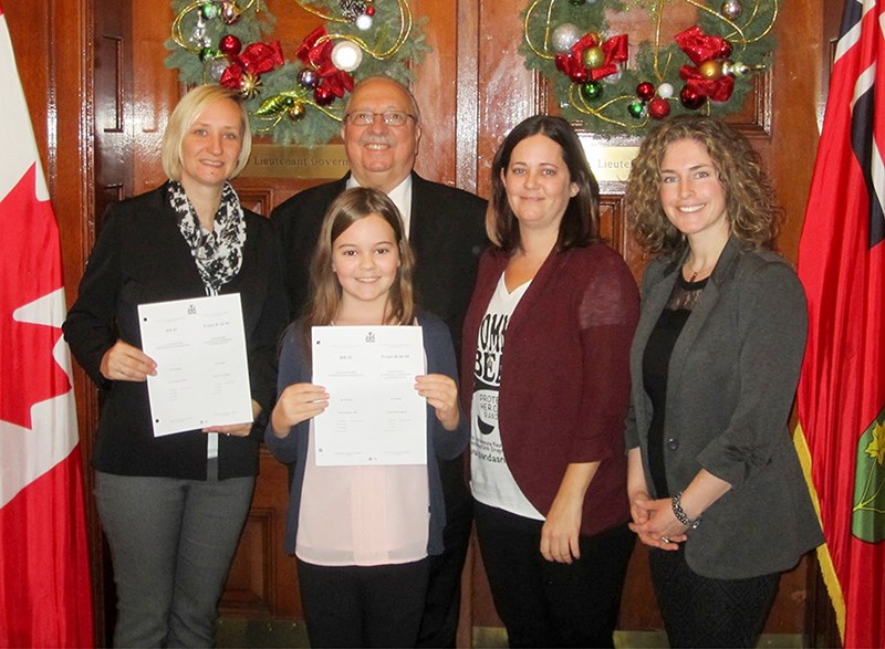 Sarnia-Lambton MPP Bob Bailey with members of PANDA/PANS Ontario, from left, Erin Kwarciak, Lena Henrikson, Kerry Henrikson and Ellen Nicol. A bill introduced by Bailey and unanimously passed in the Ontario Legislature makes Oct. 9 each year PANDA/PANS Awareness Day in the province. Submitted Photo