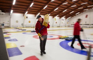 Sarnia Golf & Curling Club ice technician Brad Cook 'pebbles' a freshly scraped ice surface. Using ionized water, the technician waves a wand to spread warm water droplets over the ice, which enable players to manipulate the rock's trajectory. Troy Shantz