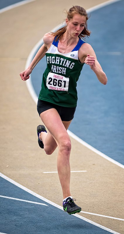 Paige Vrolyk of St. Patrick's High School won both the junior girls triple jump and long jump at the South Western Ontario Secondary School Athletic Association track and field championships. Here, she competes in the 200m dash, in which she finished third. Bruce Smith, Special to The Journal