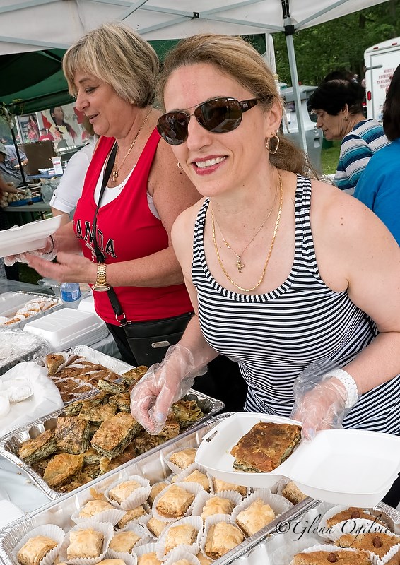 Lineups formed at the multicultural food booths in Canatara Park. Here, Sovla Kiatos serves up spanakopita, a Greek spinach pie. Glenn Ogilvie 