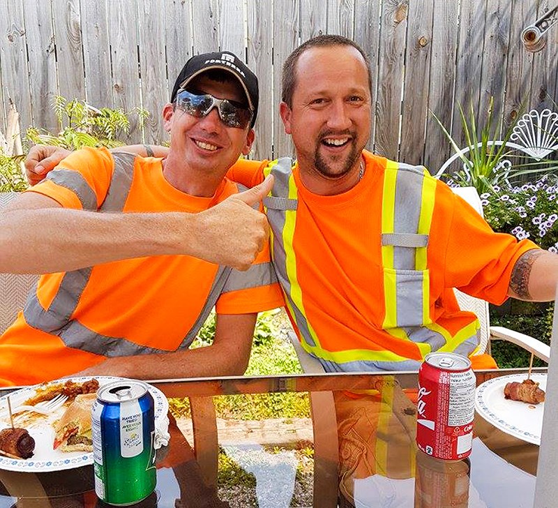 Craig Joris and Matt Taylor give the outdoor lunch a thumbs-up.