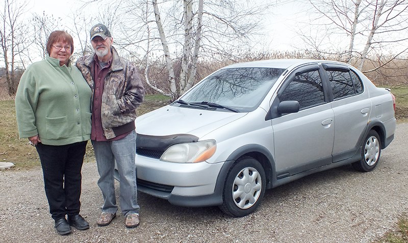 Randy and Johanna Wells with their 2000 Echo.Pam Wright