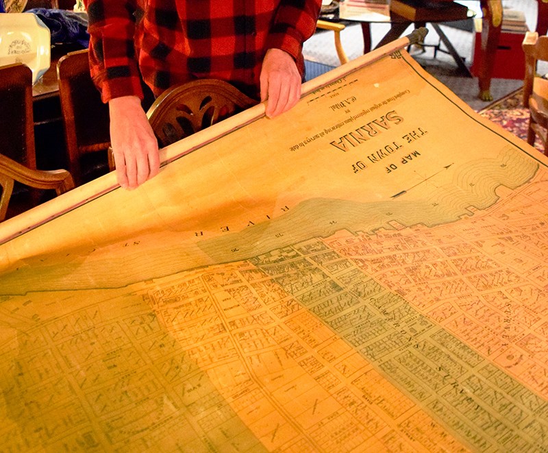 Steve Chitovas with an 1893 map of Sarnia he purchased at auction.Cathy Dobson