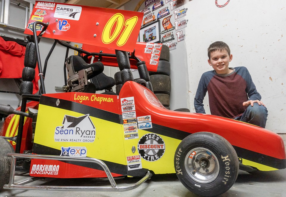 10-year-old driver Logan Chapman and his micro sprint racing car. Troy Shantz