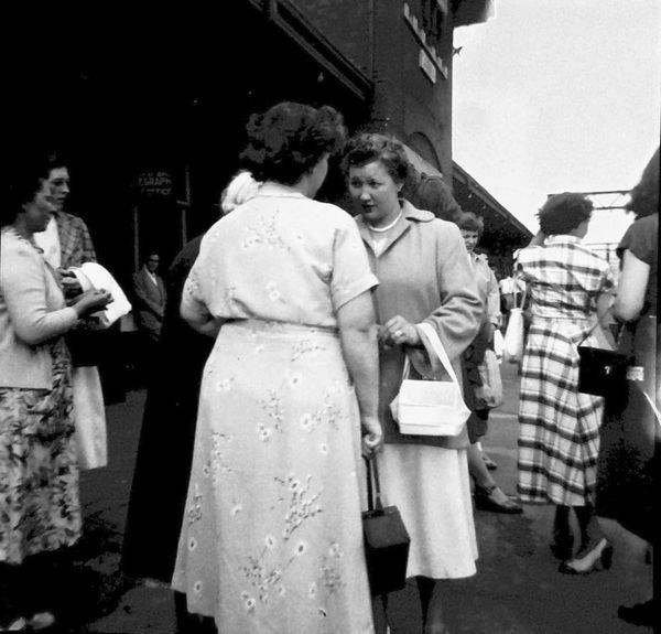 Women chatting at the Sarnia train station.