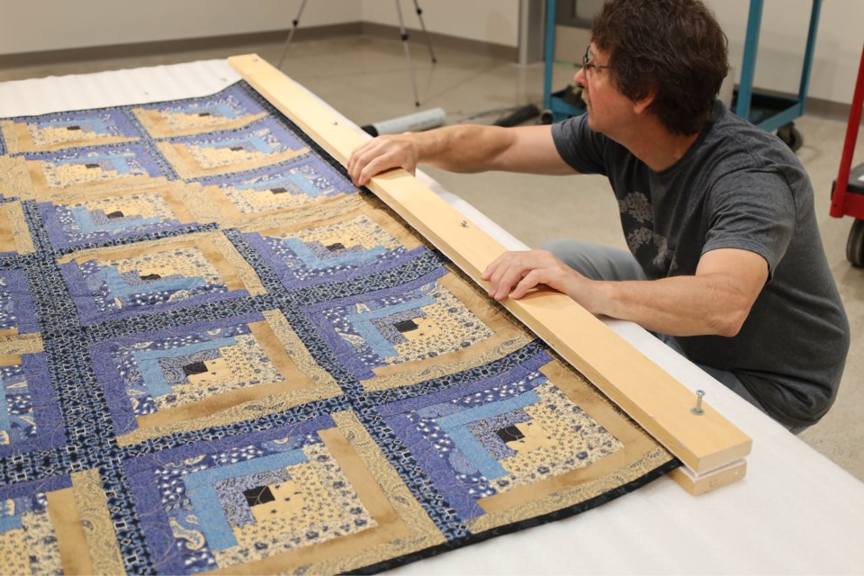 lambton-heritage-museum-prepares-quilts-for-hanging-in-the-2025-north-lambton-quilters-guild-quilt-show