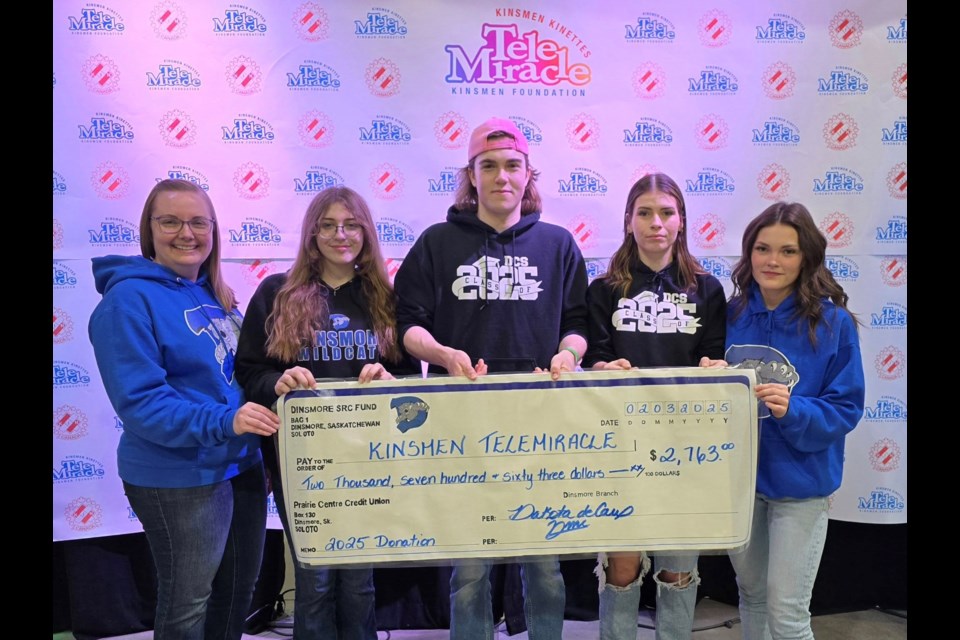 Students and staff from Dinsmore presented funds on the air. Photo credit: Dinsmore Composite School.