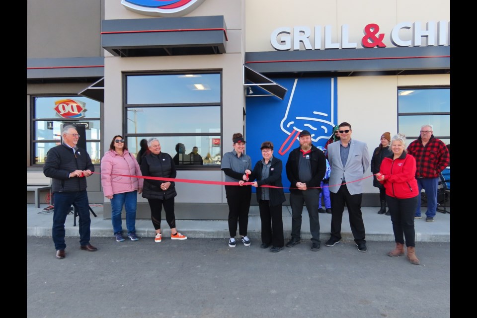 The ribbon cutting marked the official opening of the popular fast food stop. Photo: Derek Ruttle/The Outlook