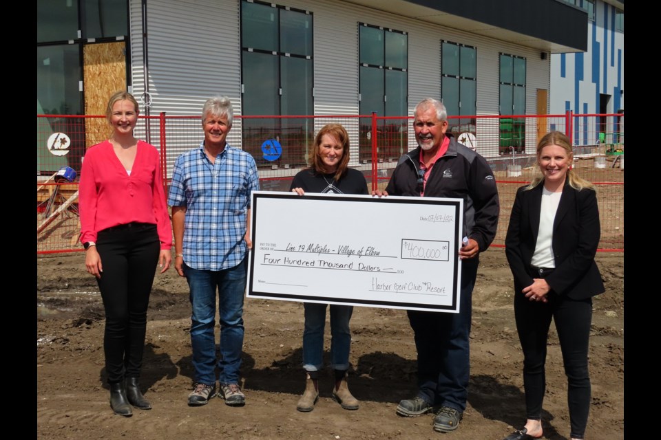 Jocelyn Veikle and Katie Vollmer on the far left and right welcomed a sizable donation of $400,000 from Rick Letts, Rhonda McTavish, and Les McTavish, representing Harbor Golf Club & Resort.