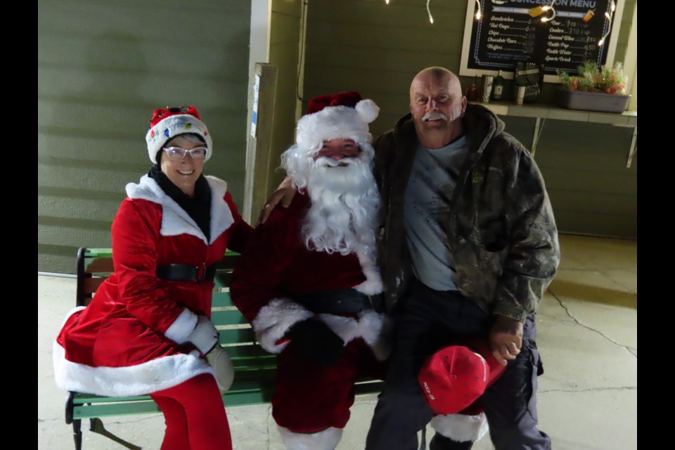 Santa and Mrs. Claus were on-location at Harbor Golf Club visiting passersby. PHOTO: Derek Ruttle/The Outlook