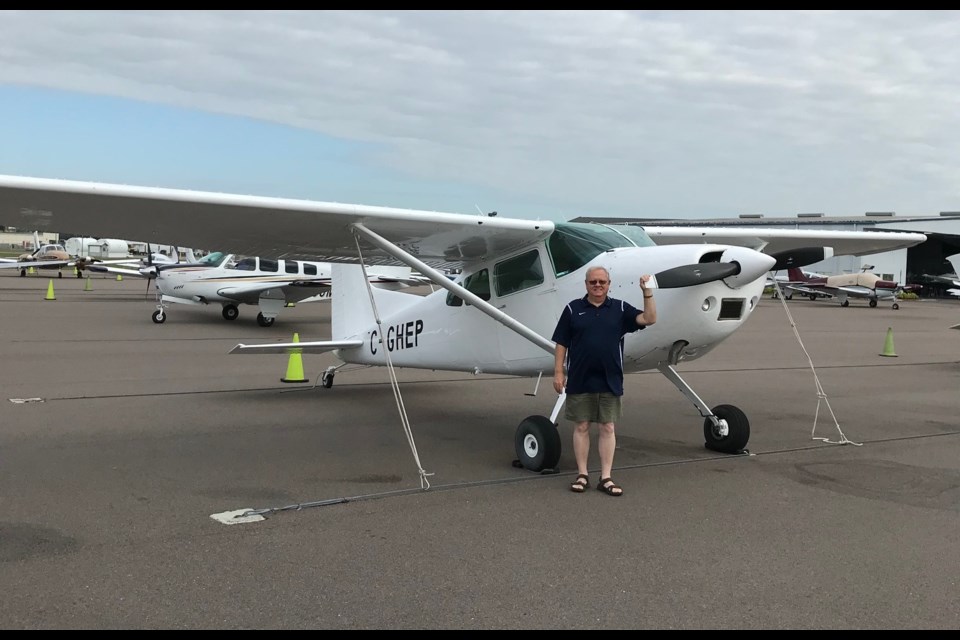 Roland with the aircraft that can now be seen in 'No Time to Die'.