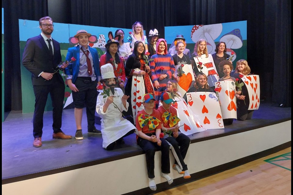 A cast photo at the show's conclusion allowed the audience to show their appreciation for these young performers. Photo by Derek Ruttle.