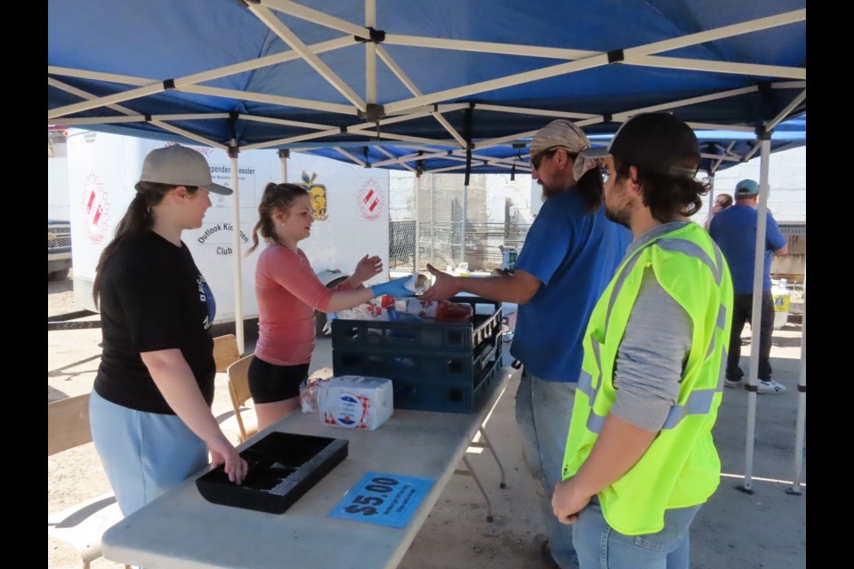 In support of the OHS Travel Club, students were on hand to help people gather their lunch. Photo by Derek Ruttle.