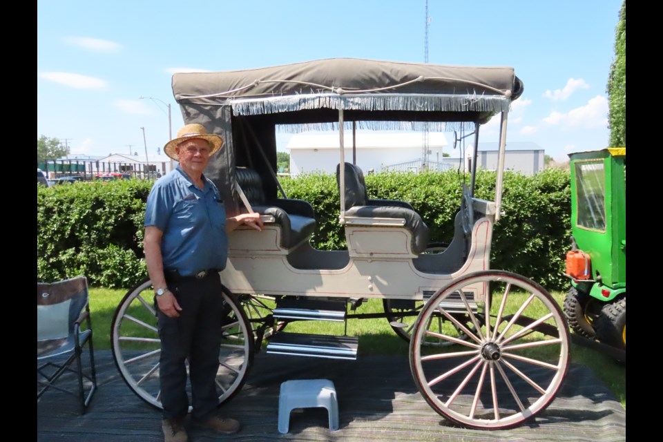 Outlook resident Rod McPherson shows off his antique buggy on display at the museum for the event. Photo: Derek Ruttle/The Outlook