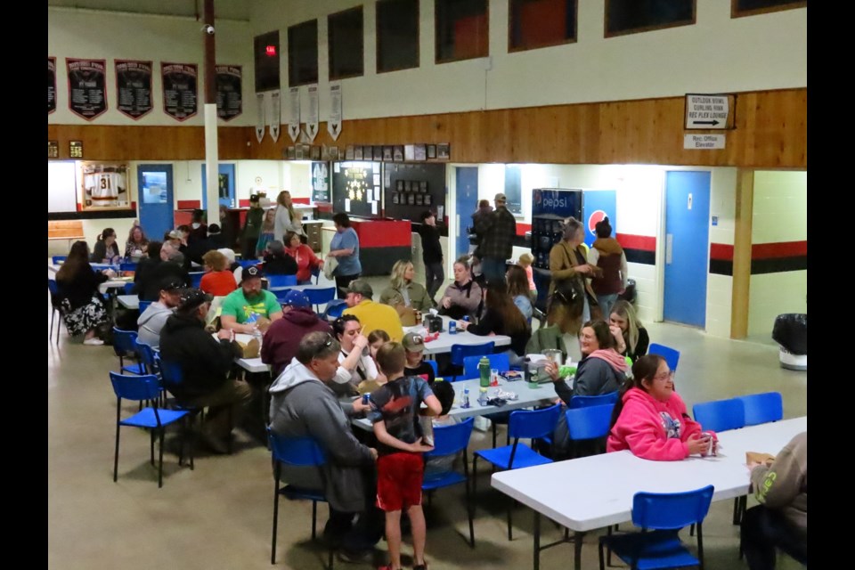 Hungry patrons filled up on chicken wings and Caesar salad. Photo by Derek Ruttle