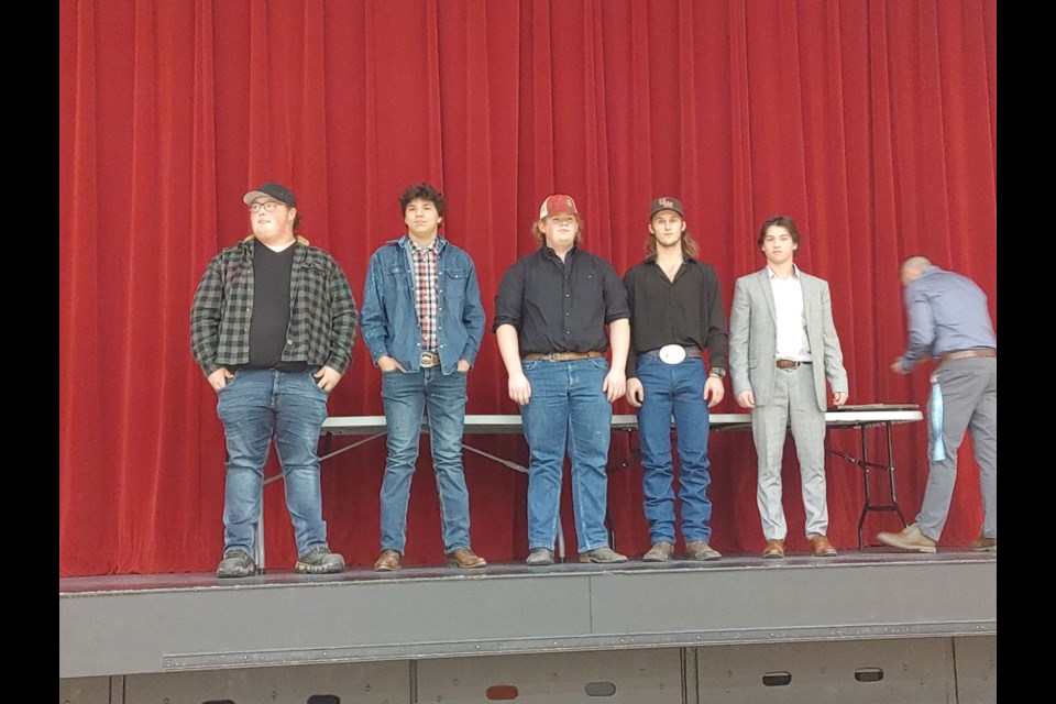 Graduates Darrien Wildeman, Kyler Kereluk, Shawn Dyck, Toby Thompson and Jared Abrams are recognized at the UCHS Warriors football banquet. 