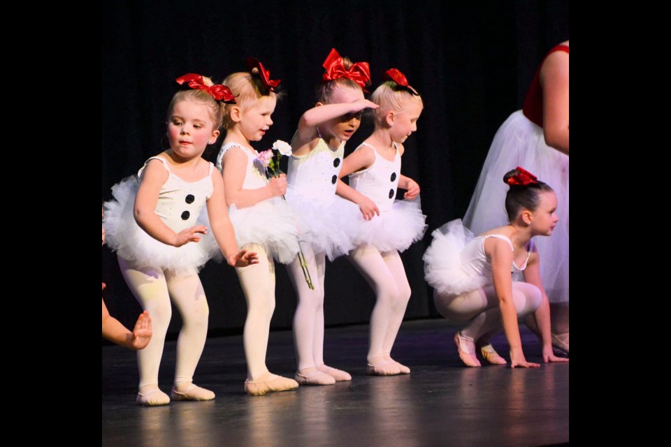 Saphena Wilson is wondering “Where’s Mom?” while Octavia Goller was so thrilled with the flowers she received she wasn’t prepared to give them up, even while onstage for her performance. Meanwhile, Rylee Tanner, Suri Grant and Carter Halter are doing their best to follow the lead of the instructors.