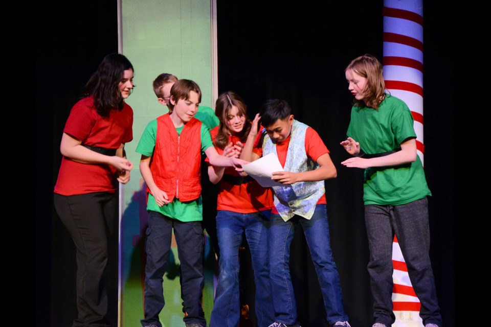 The elves in charge of the reindeer stables, Pheonix Demers, Cole Ducherer, Miles Schwartz (in back), Alexis Timms, Ron Cordita and Macyn Weber, plan a work-to-rule campaign, perhaps even an uprising.