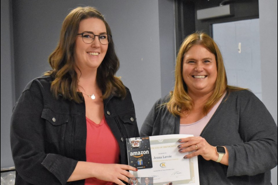 Kindersley’s outgoing chief administrative officer Audrey Hebert, right, presents a 10-year long-service award to current corporate services director Jenna Lavoie during a ceremony in 2022. Photo credit: Town of Kindersley / Facebook