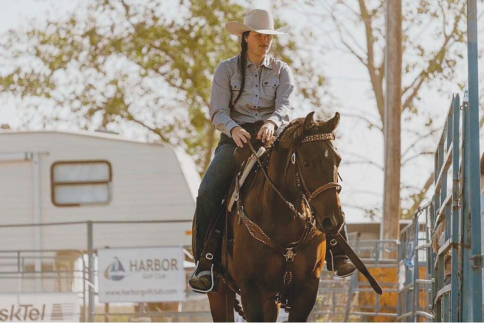 April Breault barrel racing