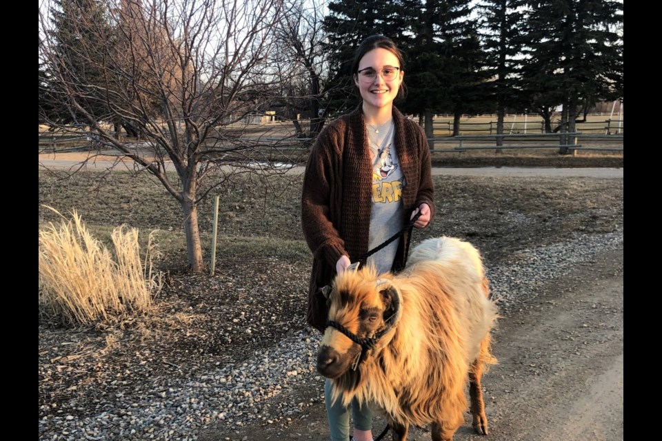 Hailey Tangjerd won the draw for Dwight the Goat. She decided Dwight would return to the ranch, and make a donation to Broken Arrow. 