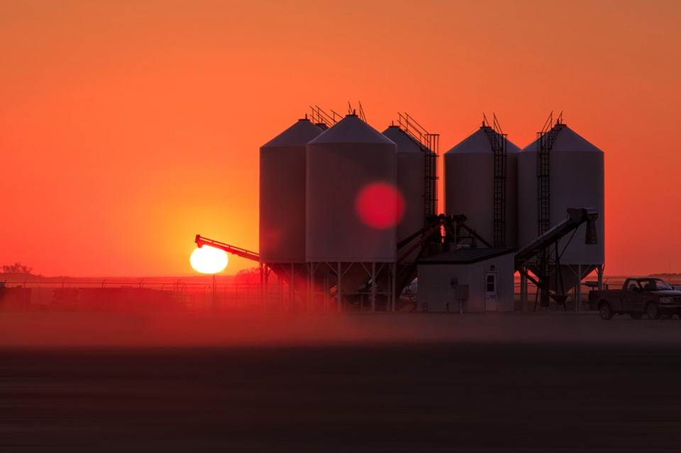 grain bins auger sunset