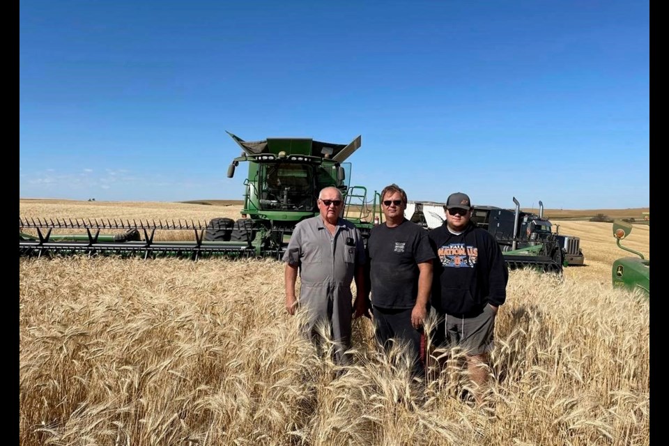 Three generations of now-retired Hansons farmers are, from left, Lorne, Kirby and Connor Hanson.