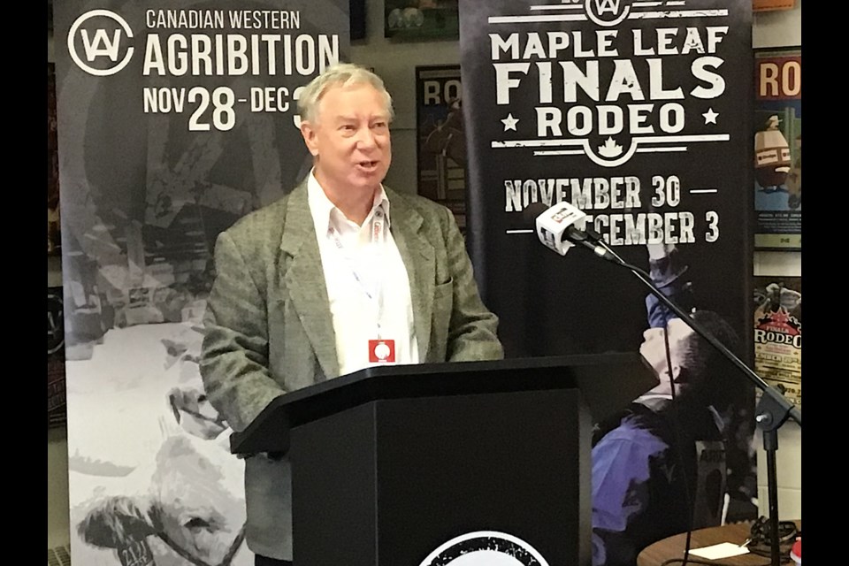 Jim Smalley at the podium as Agribition paid tribute to the retiring CKRM Farm News Director.