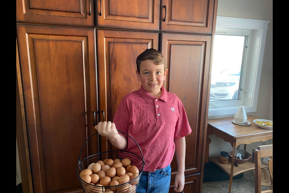 Kirk Rutten with his daily egg gathering. 


