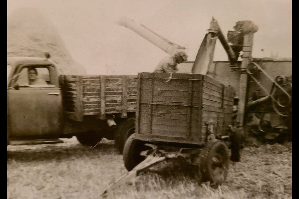 Chris and Muriel Heathcote work together on their farm near Craik, Sask., in the 1950s. 