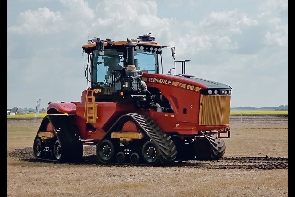 An autonomous Versatile DeltaTrak tractor was on display at the Ag in Motion farm show in July, demonstrating its ability to operate on a programmed course without operator input. 