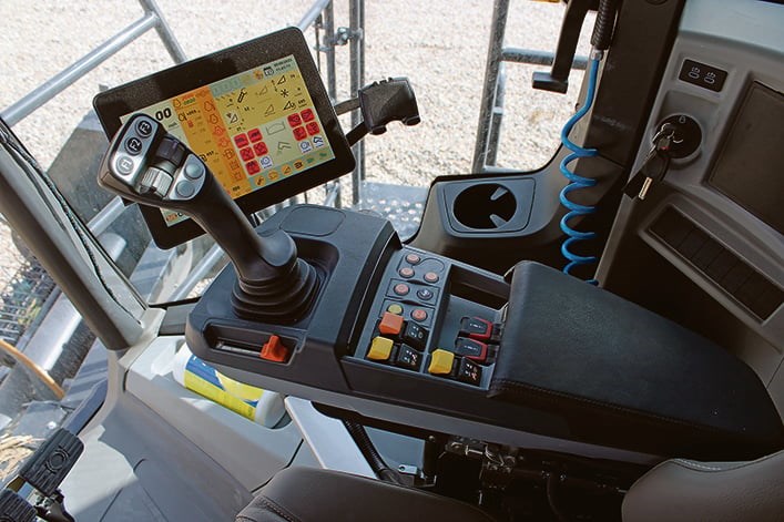 A Claas cab provides a familiar environment for the operator. 