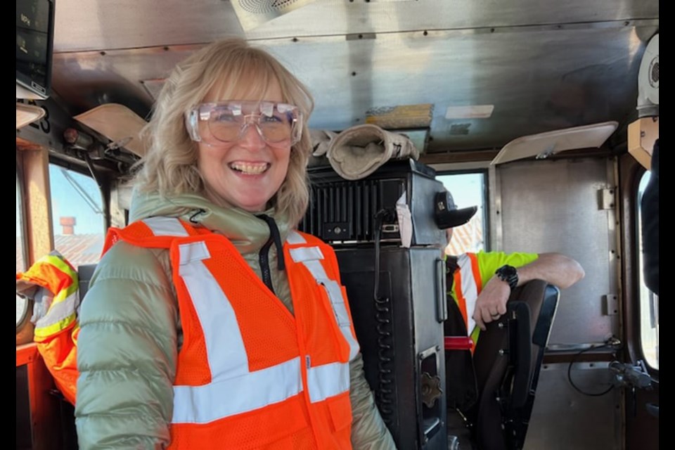 Diane Harpe onboard a train. 
