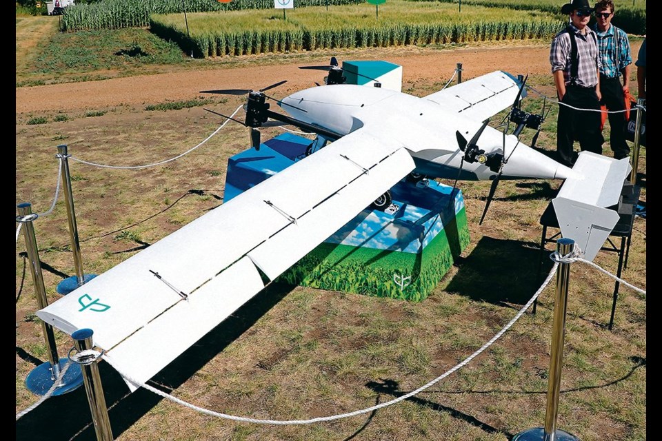 A gasoline generator is used in the Precision AI spray drone to power the rotor’s electric engines, which allows it to stay in the air for up to 2.5 hours. The drone has a 20-foot wingspan, weighs 55 kg without liquid, and has a 20-litre application tank.